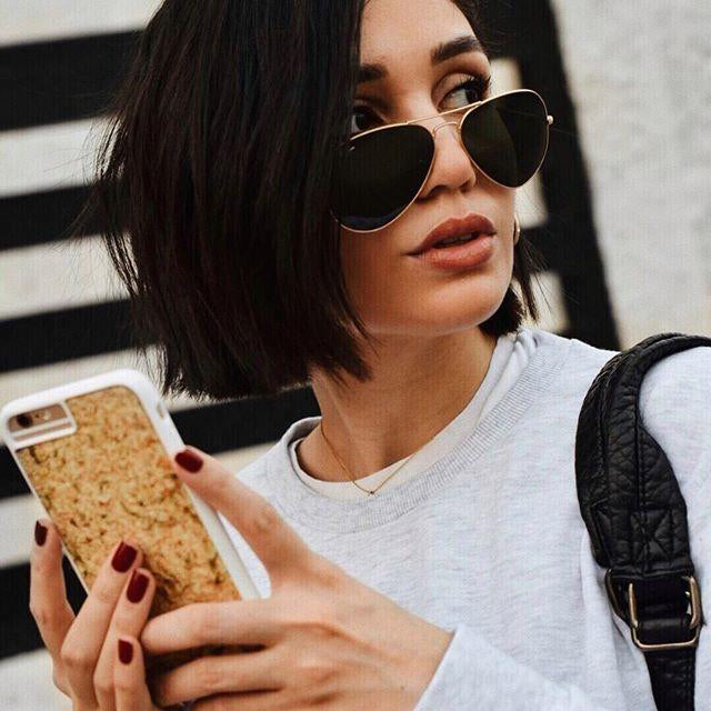 Handmade organic wood phone case with natural grain pattern on Google Pixel 7, eco-friendly sustainable design.