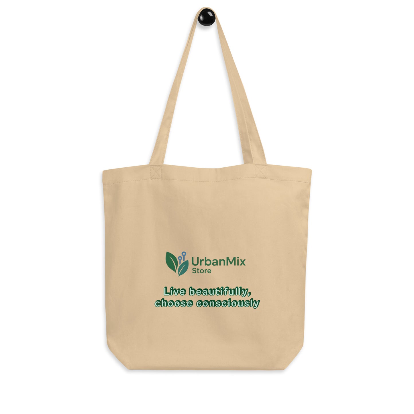 Beige tote bag back logo detail organic cotton sustainable brand message
